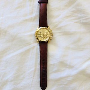 Micheal Kors gold and tan leather watch